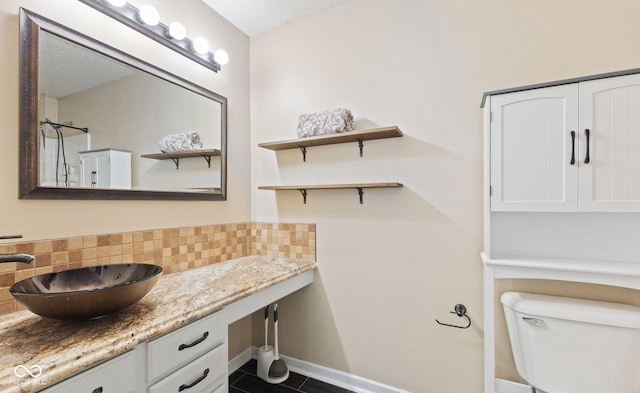 2210 Bridlewood Dr, Franklin, IN 46131 - full bath featuring backsplash, vanity, and tile patterned floors