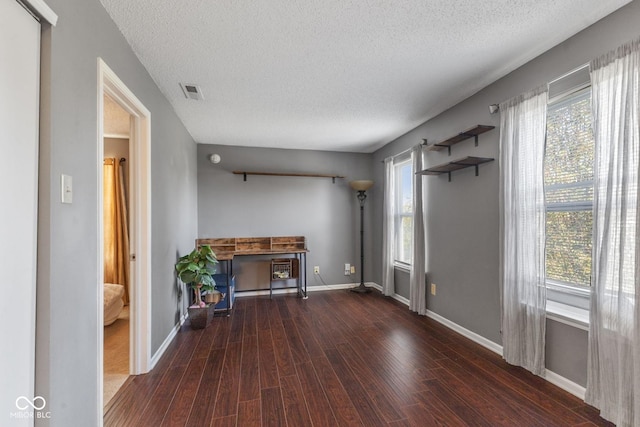 2210 Bridlewood Dr, Franklin, IN 46131 - unfurnished living room with wood finished floors and a textured ceiling