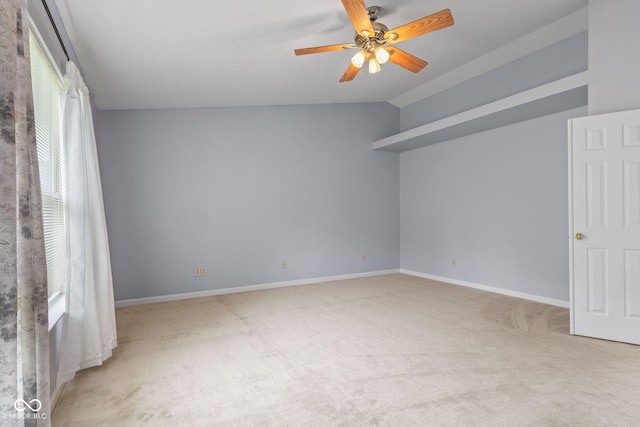 5852 Long Ridge Pl, Indianapolis, IN 46221 - carpeted spare room featuring ceiling fan, lofted ceiling, and baseboards