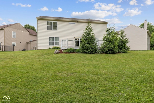 5852 Long Ridge Pl, Indianapolis, IN 46221 - back of house featuring a wooden deck
