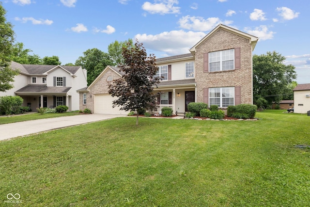 5852 Long Ridge Pl, Indianapolis, IN 46221 - traditional-style home with driveway, a front lawn, a garage, and brick siding