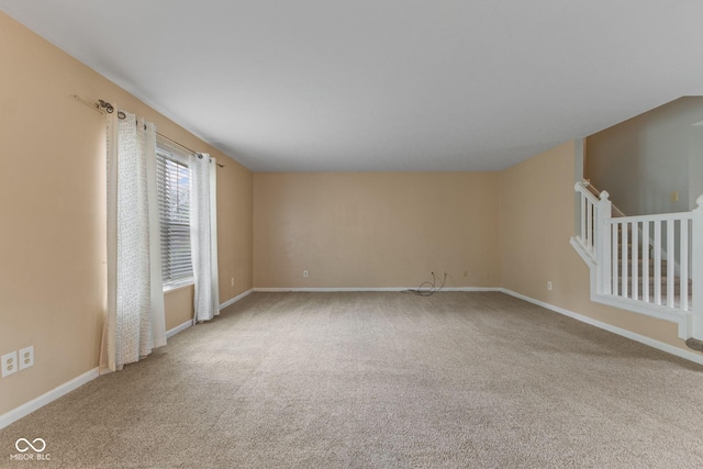 5852 Long Ridge Pl, Indianapolis, IN 46221 - spare room featuring carpet and baseboards