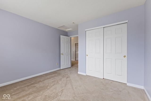 5852 Long Ridge Pl, Indianapolis, IN 46221 - unfurnished bedroom with carpet, baseboards, and a closet