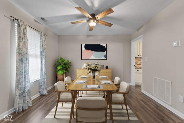 5852 Long Ridge Pl, Indianapolis, IN 46221 - dining room with a ceiling fan, dark wood finished floors, and baseboards