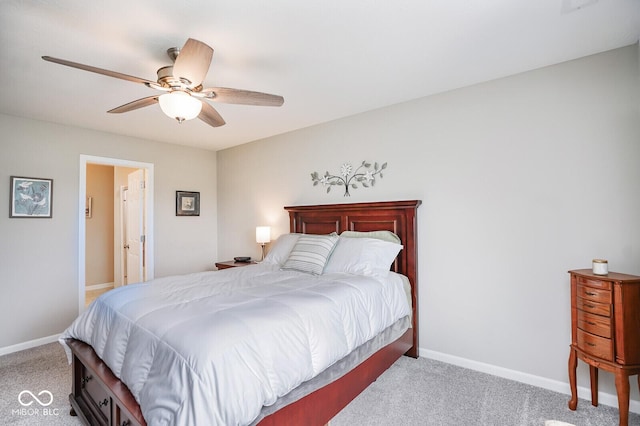 7184 Lillian Pl, Cumberland, IN 46229 - carpeted bedroom with a ceiling fan and baseboards