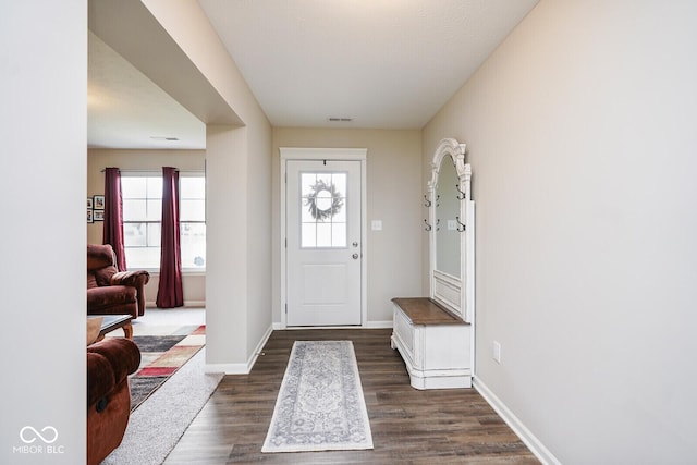 7184 Lillian Pl, Cumberland, IN 46229 - foyer entrance featuring dark wood finished floors and baseboards