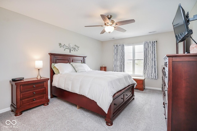 7184 Lillian Pl, Cumberland, IN 46229 - bedroom featuring light carpet, baseboards, and a ceiling fan