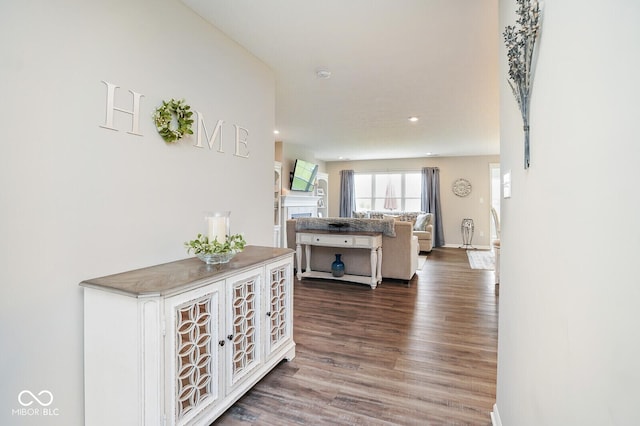 7184 Lillian Pl, Cumberland, IN 46229 - hall with dark wood-style floors, recessed lighting, and baseboards