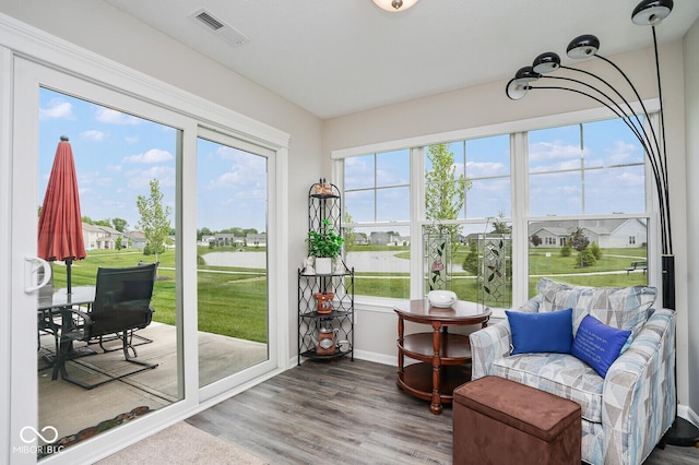 7184 Lillian Pl, Cumberland, IN 46229 - sunroom with baseboards and wood finished floors
