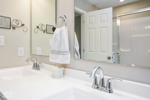7184 Lillian Pl, Cumberland, IN 46229 - bathroom featuring an enclosed shower and double vanity