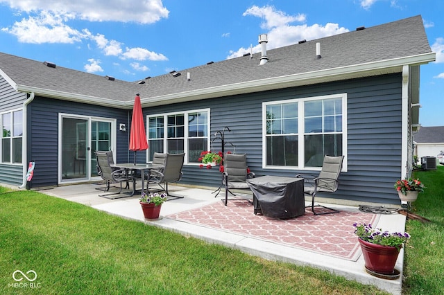 7184 Lillian Pl, Cumberland, IN 46229 - back of house with a patio, a yard, central AC, and a shingled roof