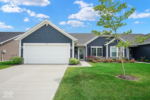 7184 Lillian Pl, Cumberland, IN 46229 - single story home with a front yard, concrete driveway, and a garage