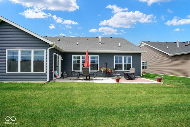 7184 Lillian Pl, Cumberland, IN 46229 - rear view of house featuring a patio area and a yard