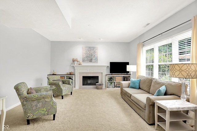 10965 Fairway Ridge Ln, Fishers, IN 46037 - living room featuring carpet, a fireplace, and baseboards