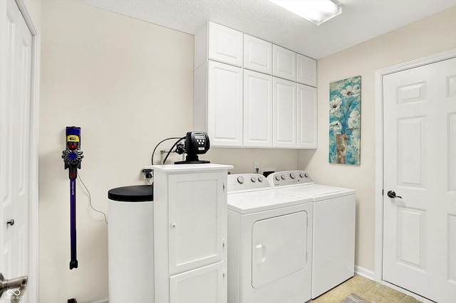 10965 Fairway Ridge Ln, Fishers, IN 46037 - laundry room featuring cabinet space, independent washer and dryer, light tile patterned floors, and baseboards