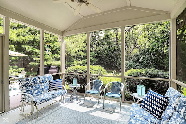 10965 Fairway Ridge Ln, Fishers, IN 46037 - sunroom / solarium featuring ceiling fan, lofted ceiling, healthy amount of natural light, and view of wooded area