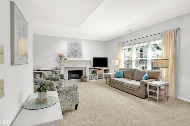 10965 Fairway Ridge Ln, Fishers, IN 46037 - carpeted living room featuring a fireplace and baseboards