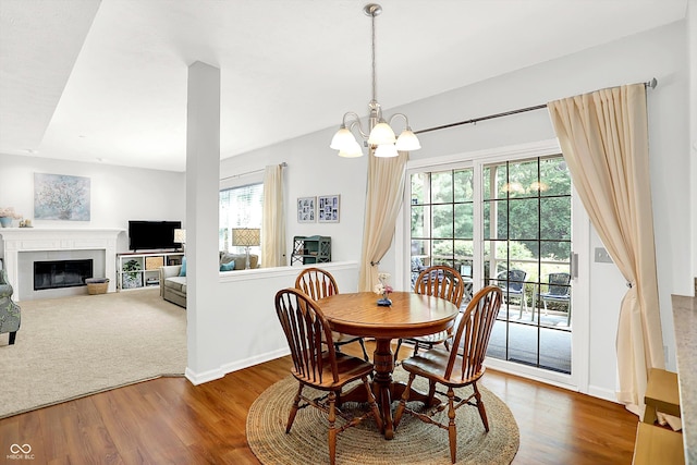 10965 Fairway Ridge Ln, Fishers, IN 46037 - dining room featuring plenty of natural light, wood finished floors, and a chandelier