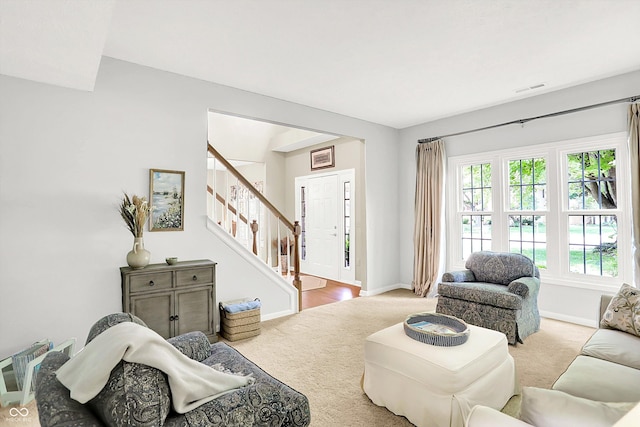 10965 Fairway Ridge Ln, Fishers, IN 46037 - living room featuring carpet, stairway, and baseboards