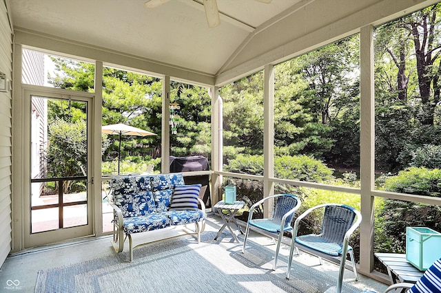10965 Fairway Ridge Ln, Fishers, IN 46037 - sunroom with a ceiling fan, lofted ceiling, and view of wooded area