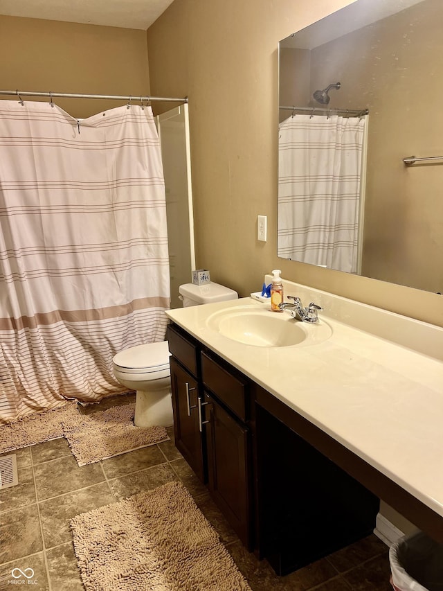 1518 Valdarno Dr, Greenwood, IN 46143 - bathroom with vanity, toilet, and a shower with shower curtain
