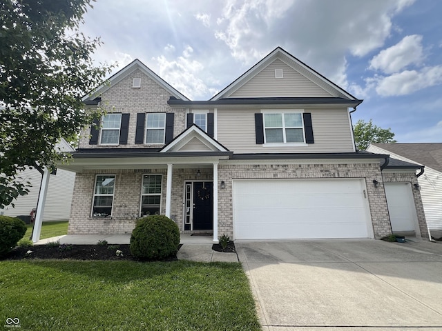 1518 Valdarno Dr, Greenwood, IN 46143 - view of front of house with driveway, brick siding, an attached garage, a porch, and a front yard