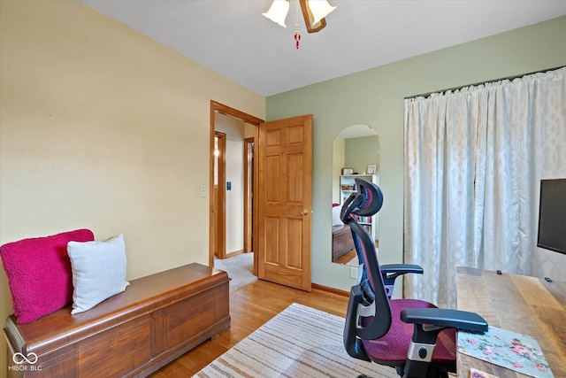 580 Northgate Dr, Greenwood, IN 46143 - office space with light wood-style floors, arched walkways, and ceiling fan