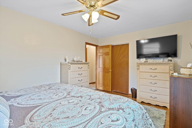 580 Northgate Dr, Greenwood, IN 46143 - bedroom with wood finished floors and a ceiling fan
