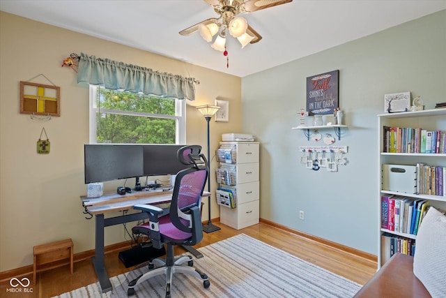 580 Northgate Dr, Greenwood, IN 46143 - office with ceiling fan, wood finished floors, and baseboards
