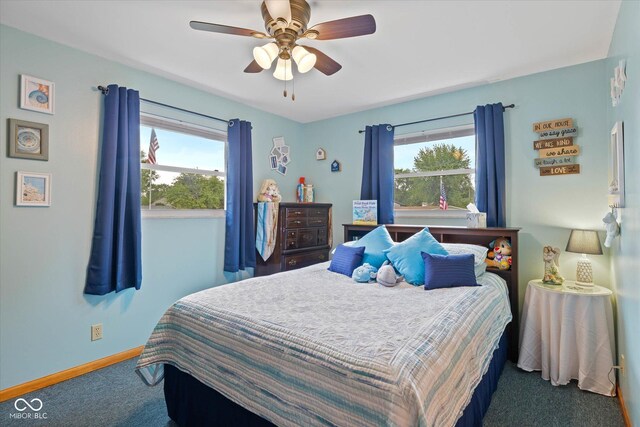 580 Northgate Dr, Greenwood, IN 46143 - carpeted bedroom with baseboards and ceiling fan
