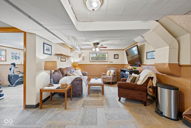 580 Northgate Dr, Greenwood, IN 46143 - living area featuring light carpet, a ceiling fan, and wainscoting