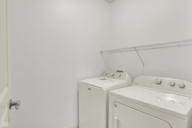 5125 Lilium Dr, Plainfield, IN 46168 - washroom featuring washer and dryer and baseboards