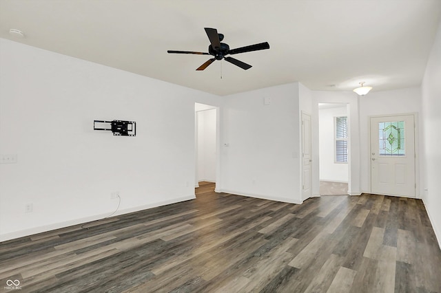 5125 Lilium Dr, Plainfield, IN 46168 - spare room featuring dark wood-style floors, ceiling fan, and a smoke detector