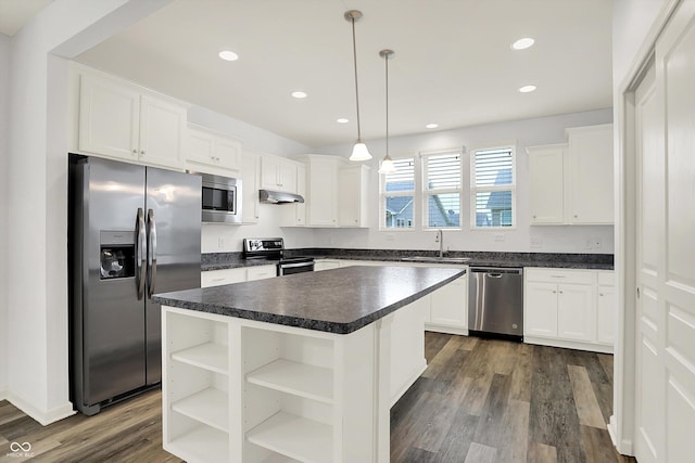 5125 Lilium Dr, Plainfield, IN 46168 - kitchen with appliances with stainless steel finishes, dark countertops, white cabinetry, open shelves, and recessed lighting