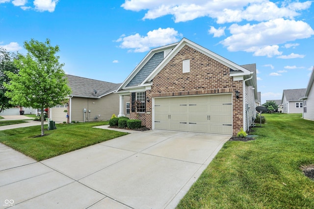 5125 Lilium Dr, Plainfield, IN 46168 - view of front of property with brick siding, a front lawn, concrete driveway, and an attached garage