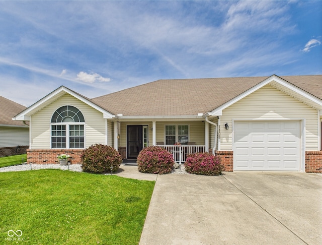 1108 Northfield Ln, Anderson, IN 46011 - single story home featuring brick siding, a porch, a front yard, a garage, and driveway