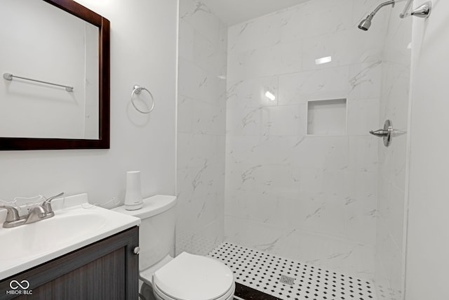 1411 N Grant Ave, Indianapolis, IN 46201 - full bath with toilet, vanity, and tiled shower