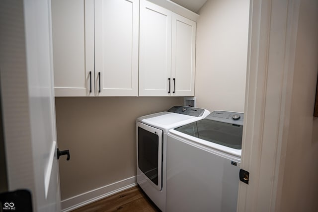 3463 Plum Creek Rd, Nashville, IN 47448 - laundry area with independent washer and dryer, cabinet space, dark wood-style flooring, and baseboards