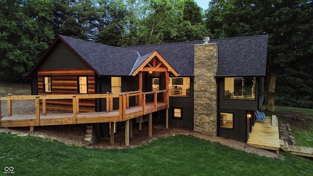 3463 Plum Creek Rd, Nashville, IN 47448 - back of property with a chimney, a yard, a deck, and a shingled roof