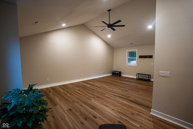 3463 Plum Creek Rd, Nashville, IN 47448 - unfurnished living room with ceiling fan, wood finished floors, vaulted ceiling, baseboards, and recessed lighting