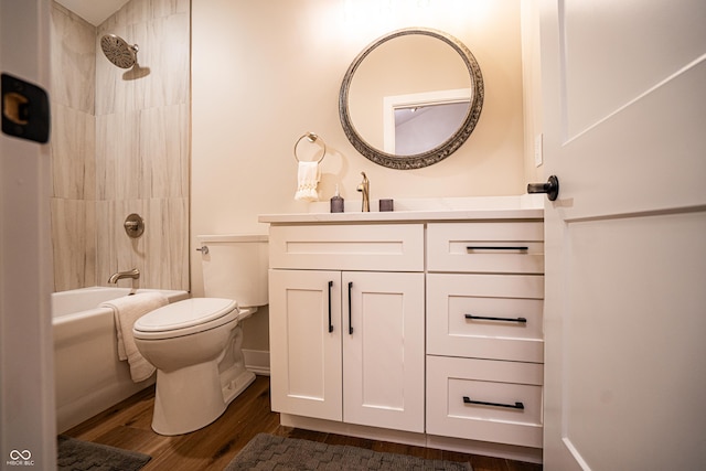 3463 Plum Creek Rd, Nashville, IN 47448 - full bath featuring toilet, vanity, wood finished floors, and shower / tub combination
