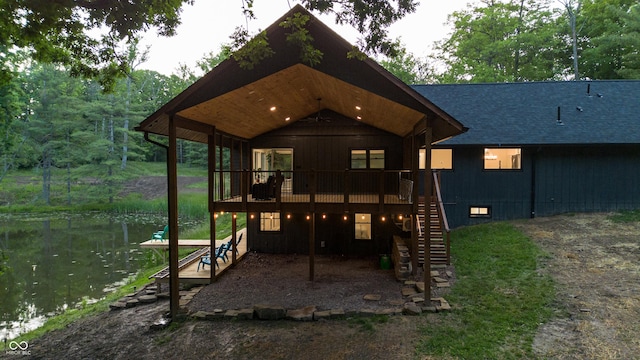 3463 Plum Creek Rd, Nashville, IN 47448 - back of property featuring stairs, roof with shingles, and a wooden deck