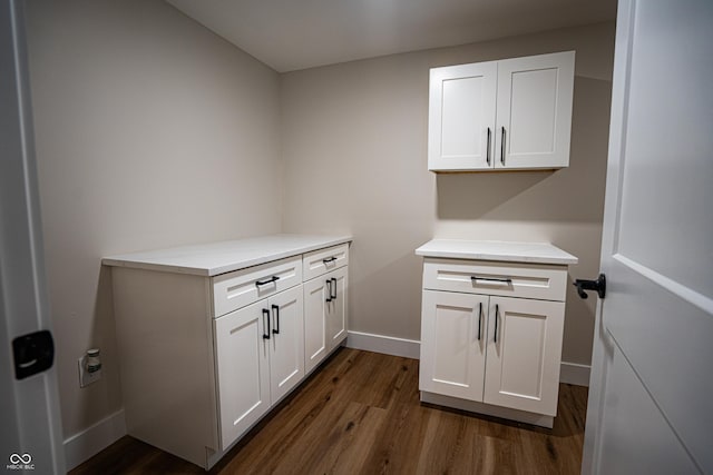 3463 Plum Creek Rd, Nashville, IN 47448 - washroom with dark wood-style floors and baseboards
