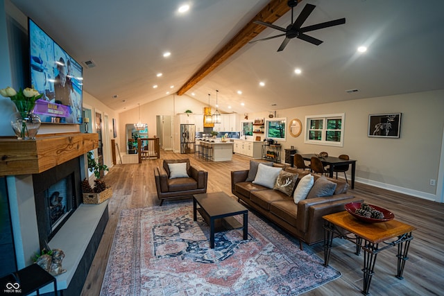 3463 Plum Creek Rd, Nashville, IN 47448 - living room featuring wood finished floors, ceiling fan, baseboards, a chandelier, and recessed lighting