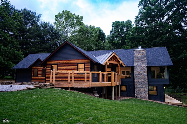 3463 Plum Creek Rd, Nashville, IN 47448 - rear view of house with a lawn, a deck, a chimney, and a shingled roof