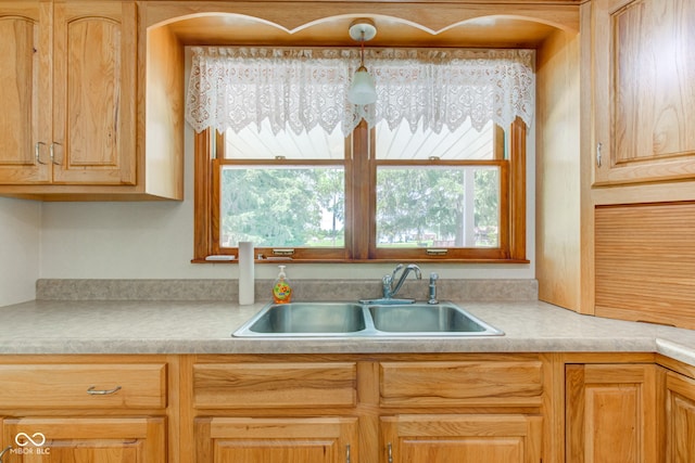 132 S First St, Jamestown, IN 46147 - kitchen with a sink, light countertops, and hanging light fixtures