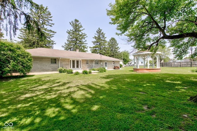 132 S First St, Jamestown, IN 46147 - rear view of property with a chimney and a gazebo