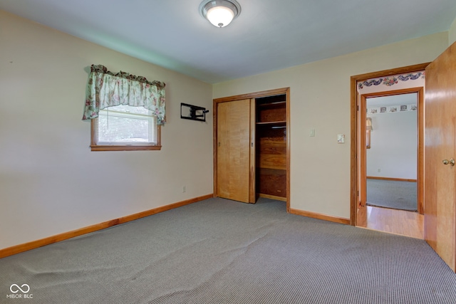 132 S First St, Jamestown, IN 46147 - unfurnished bedroom with light carpet, baseboards, and a closet