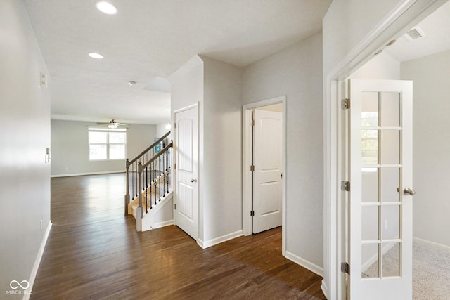 6830 Park Grove Blvd, Whitestown, IN 46075 - hall with baseboards, wood finished floors, stairs, and recessed lighting