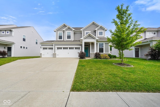 6830 Park Grove Blvd, Whitestown, IN 46075 - view of front of house featuring driveway, a front lawn, and a garage